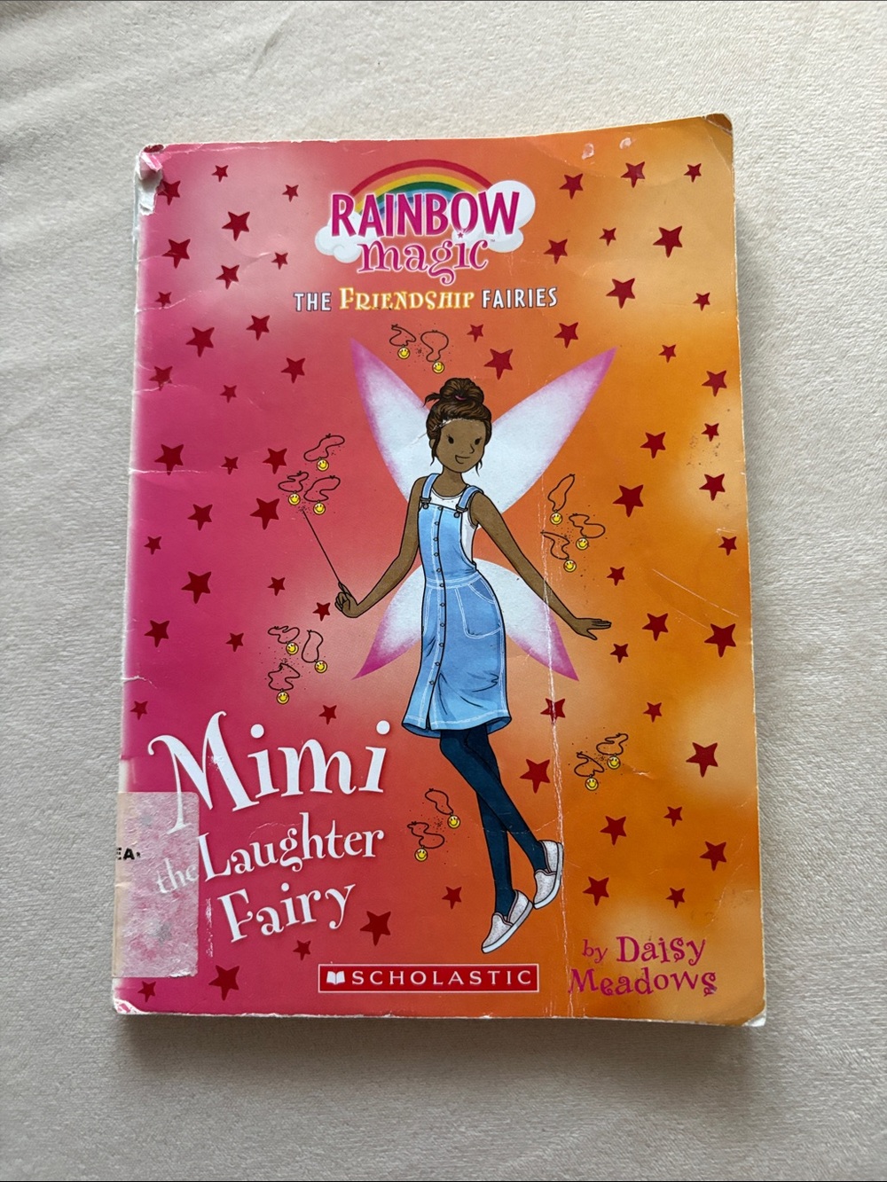 Scholastic Rainbow Magic Mimi the Laughter Fairy - Pink & Orange Cover